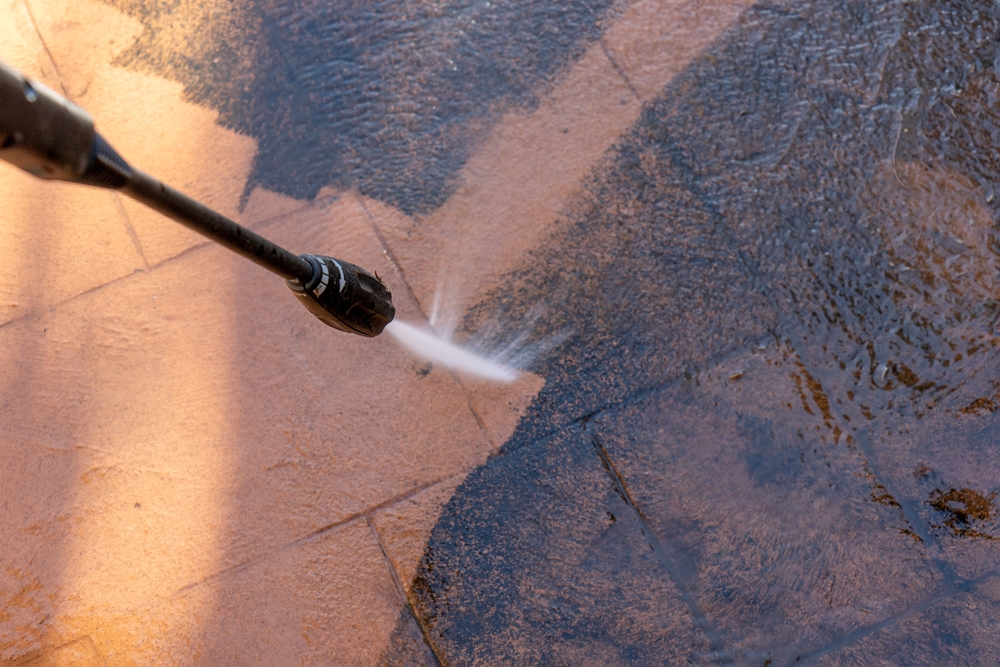 High-pressure driveway cleaning Westchester NY removing stains.