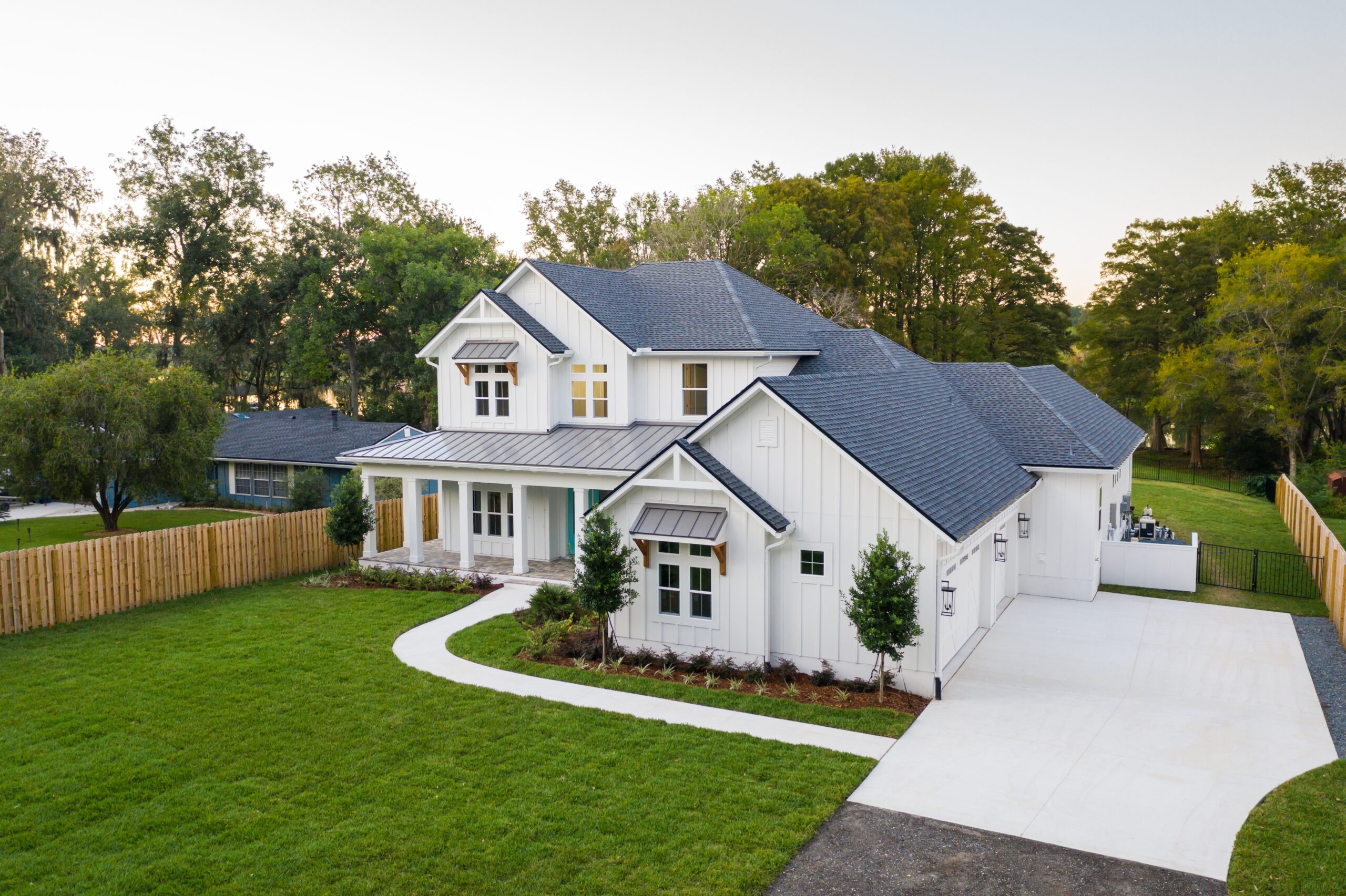 Freshly power washed home in Eastchester NY with clean siding, roof, and driveway
