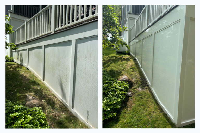 Technician soft washing vinyl siding on a White Plains NY home to safely remove algae, mildew, dirt, and environmental buildup
