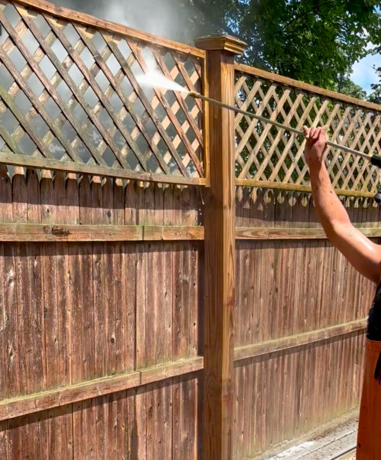 Professional wood fence cleaning service in White Plains NY removing dirt, algae, mildew, and weather-related staining