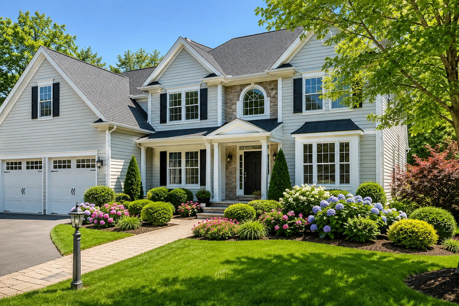 Beautiful professionally cleaned Colonial home in Ardsley, NY featuring spotless siding, a clean roof, pristine landscaping, and exceptional curb appeal.